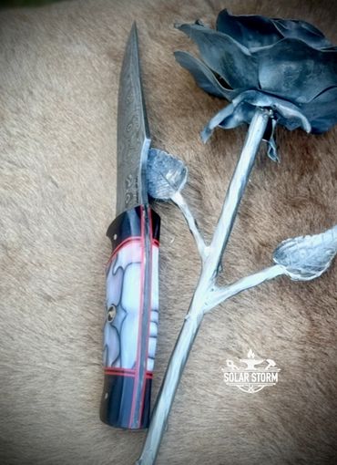 Damascus Bowie from Bladesmith in Alberta Canada top view