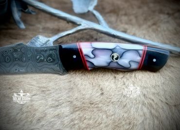 Damascus Bowie from Bladesmith in Alberta Canada handle view