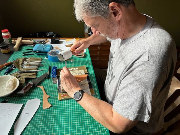 Sheath making learning to tool leather
