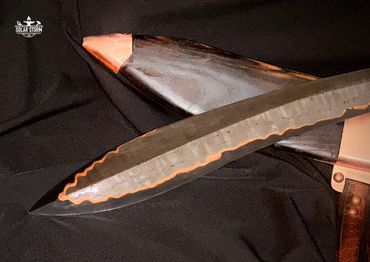 tip of CuMai Damascus Kopis Sword by Alberta blacksmith and bladesmith