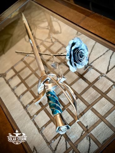 Rapier with fluted handle by custom alberta canada bladesmith