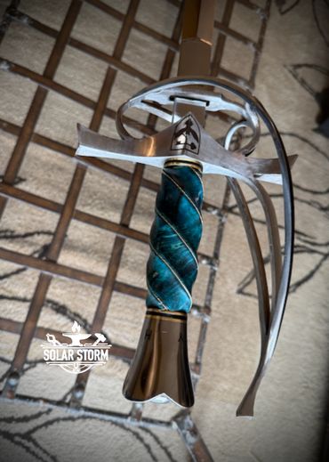 Rapier with fluted handle by custom alberta canada bladesmith