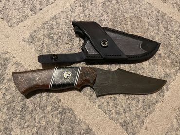 5" damascus hunting knife with copper accent epoxy handle and sheath