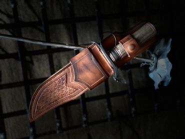 rigth side in sheath Take down Bowie blade with ring guard elk antler handle.