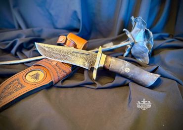Damascus hunting bowie and brass with leather sheath Solar Storm Bladesmith Alberta Canada