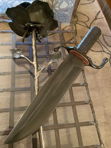 10" Bowie with Oak Frame handle. Traditional bowie with a nice long sharp blade.