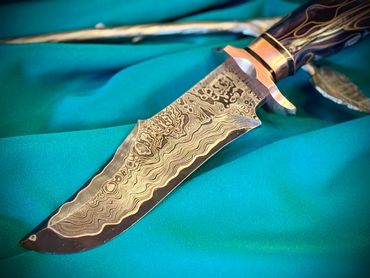 Blade left Side of a CuMai Damascus knife with Copper Accents by Custom Albert Bladesmith Solar Stor