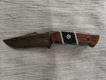 5" damascus hunting knife with copper accent epoxy handle
