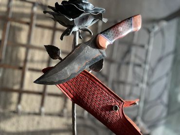 in sunshite Damascus CuMai hunting knife.