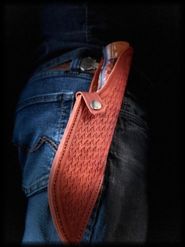 on belt Damascus CuMai hunting knife.  15n20 and 1084 copper shims epoxy dragon scales handle