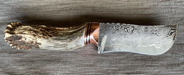 cumai damascus skinning knife custom filework on spine