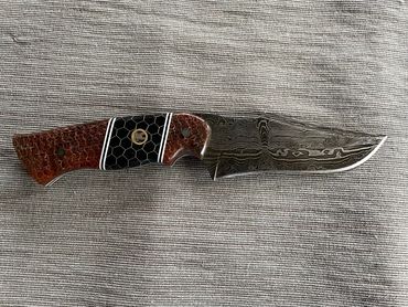 5" damascus hunting knife with copper accent epoxy handle