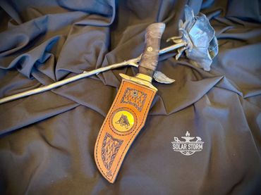 Damascus hunting bowie and brass with leather sheath Solar Storm Bladesmith Alberta Canada
