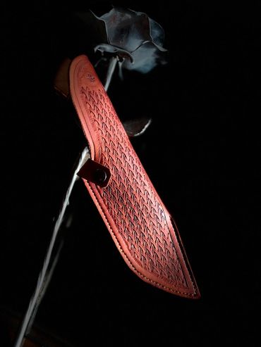 sheath Damascus CuMai hunting knife.  15n20 and 1084 copper shims epoxy dragon scales handle