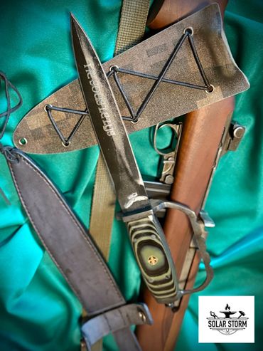 parkerized trench knife by custom alberta blacksmith and bladesmtih - solarstorm