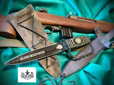 front view parkerized trench knife by custom alberta blacksmith and bladesmtih - solarstorm