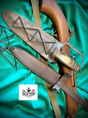 parkerized trench knife in kydex sheath by custom alberta blacksmith and bladesmtih - solarstorm