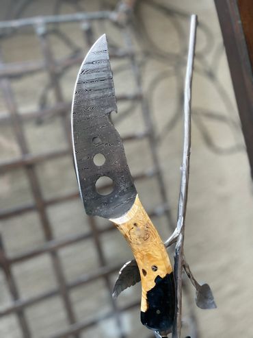 ladder pattern damascus chefs knife blade highlight