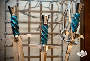 Rapier, sword and dagger handles with fluted handles by custom alberta canada bladesmith