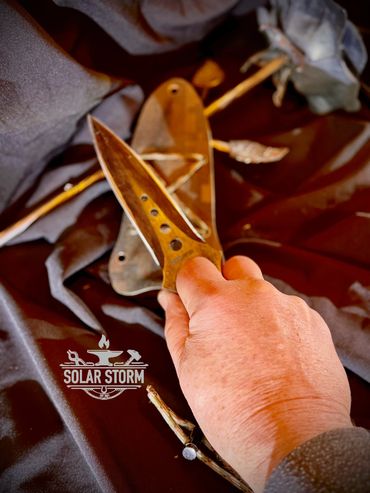 Tactical dagger by Custom Alberta Bladesmith complete with paracord handle and kydex sheath