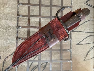 10" Bowie with Oak Frame handle. Traditional bowie with a nice long sharp blade. Scout sheath