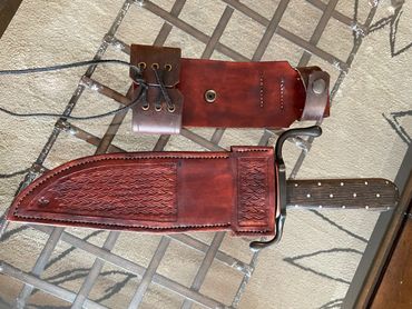 10" Bowie with Oak Frame handle. Traditional bowie with a nice long sharp blade. Scout sheath