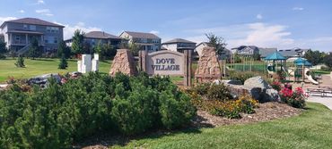Image of Dove Village park and sign
