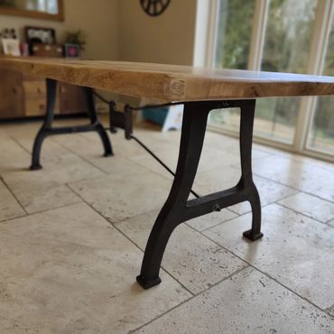 Solid oak dining table with cast iron legs 