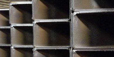 Rectangle carbon steel tube stacked awaiting manufacturing operations