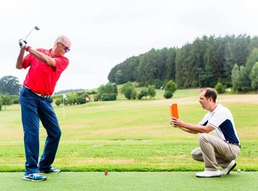 Golfer hitting the ball
