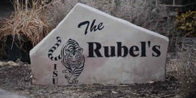 I cut 1/8" rubber on the waterjet for a mask and then sandblasted this onto a rock.