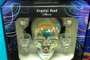 liquor gift set. box of crystal head alcohol. crystal skull and 4 shot glasses in nice package.