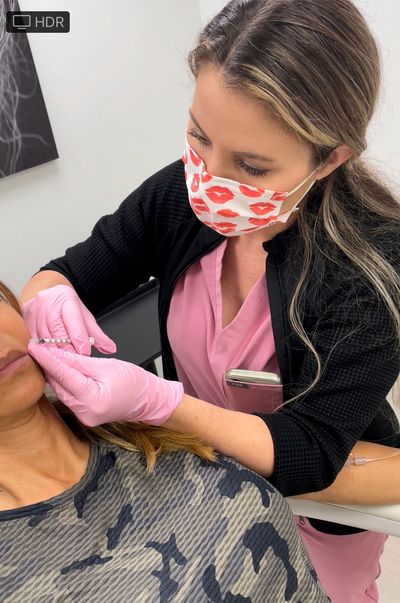 a dermatologist doing treatment