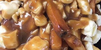 Poutine made with fresh cut fries, signature gravy and real Canadian cheese curds