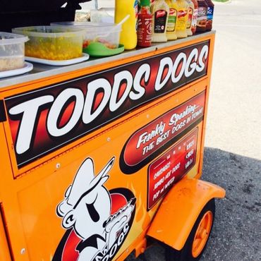 A close-up shot of Todd's Dogs original hotdog cart 