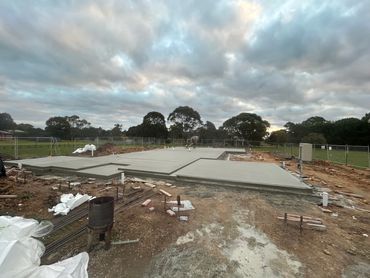 House slab obviously under construction with temporary fencing around it