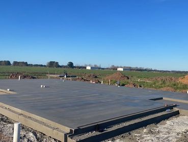 House slab with paddocks in the background