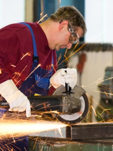 ERP Solutions and Consulting for the Manufacturing Industry, worker in shop grinding