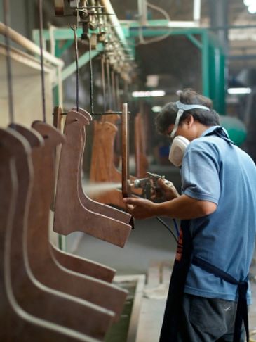 ERP Solutions and Consulting for the Manufacturing Industry, worker in shop painting