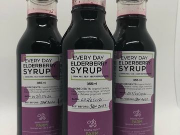 Three bottles of Everyday Elderberry Syrup