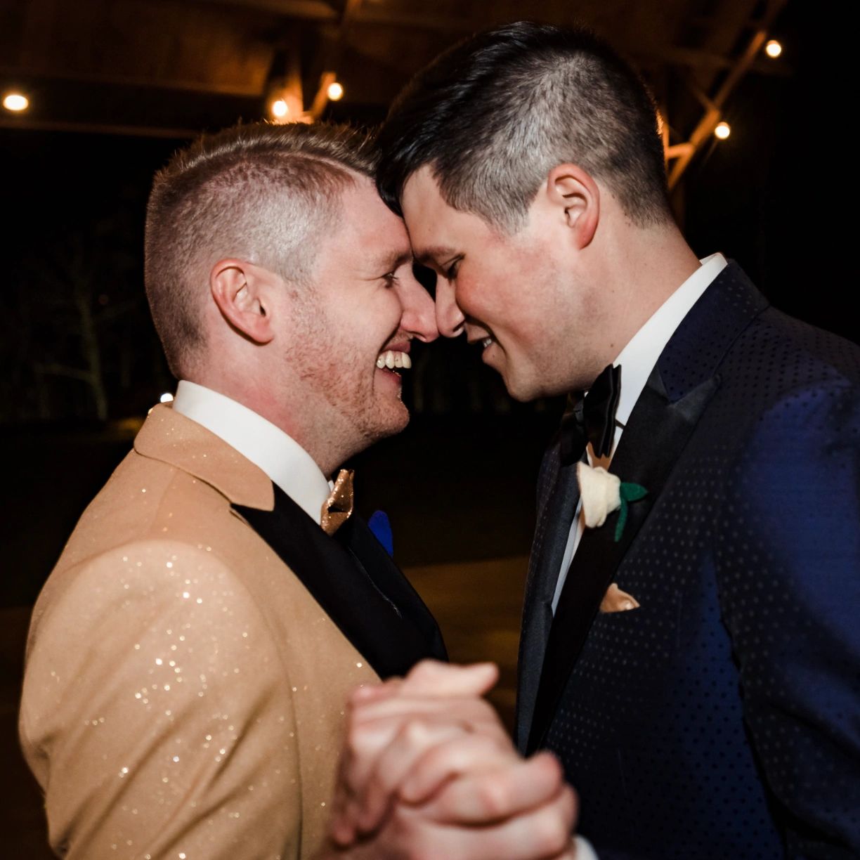 LGBT greenville wedding grooms sharing a first dance with Remix Weddings Greenville DJ