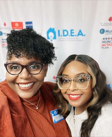 Danielle Denton (Doctoral Student; pictured far right) and Dr. Alicia Cooper Denton (far left)