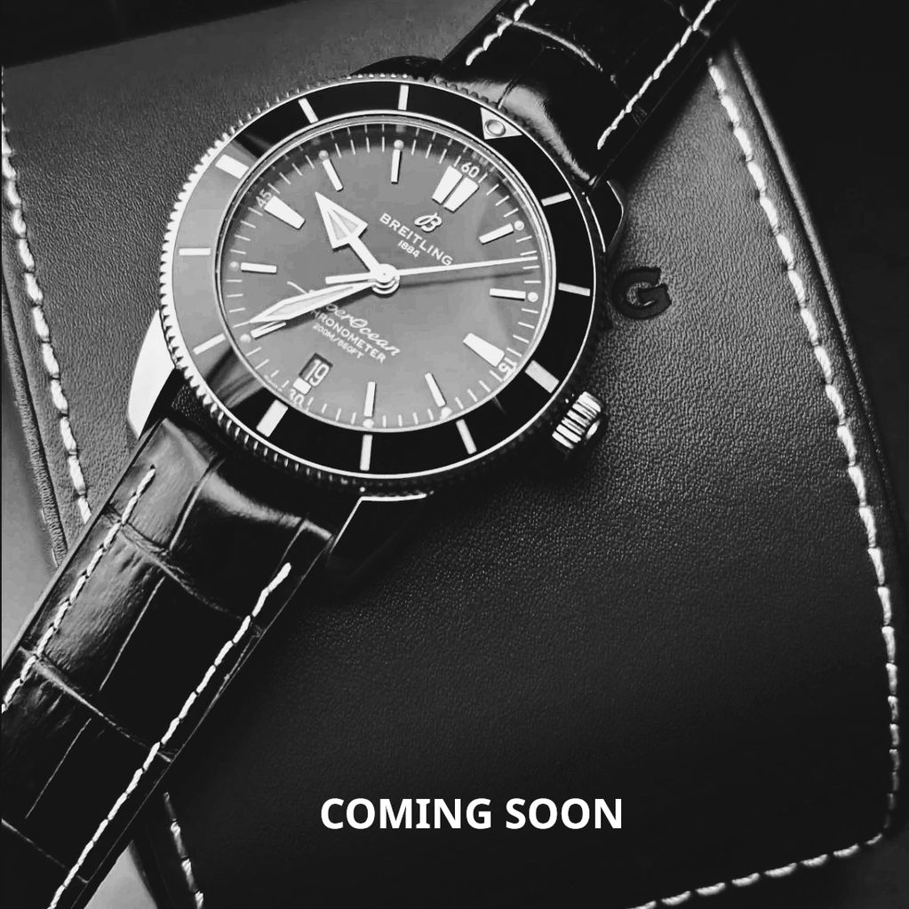 Breitling watch with leather strap.