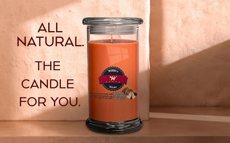 VMP 16oz candle on  a stone table  with stucco background . All Natural. The candle for you