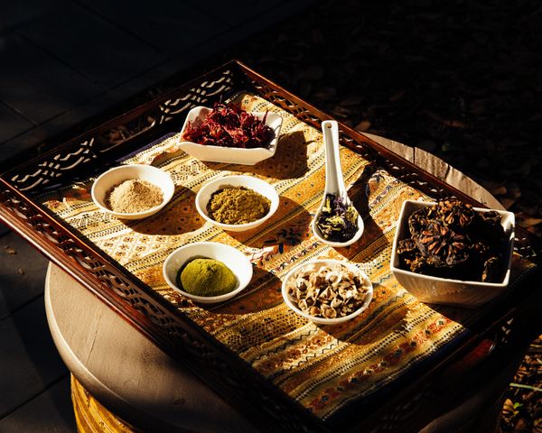 Depicts dried Rosella, Akuamma, Cat's Claw, Moringa powder, Moringa seeds,Blue Butterfly Pea, Noni