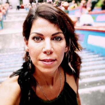 Sunny Ju. Tantra health instructor and world traveler from Germany. De Armoring