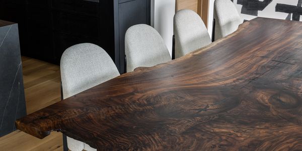 Single slab live edge claro walnut dining table.