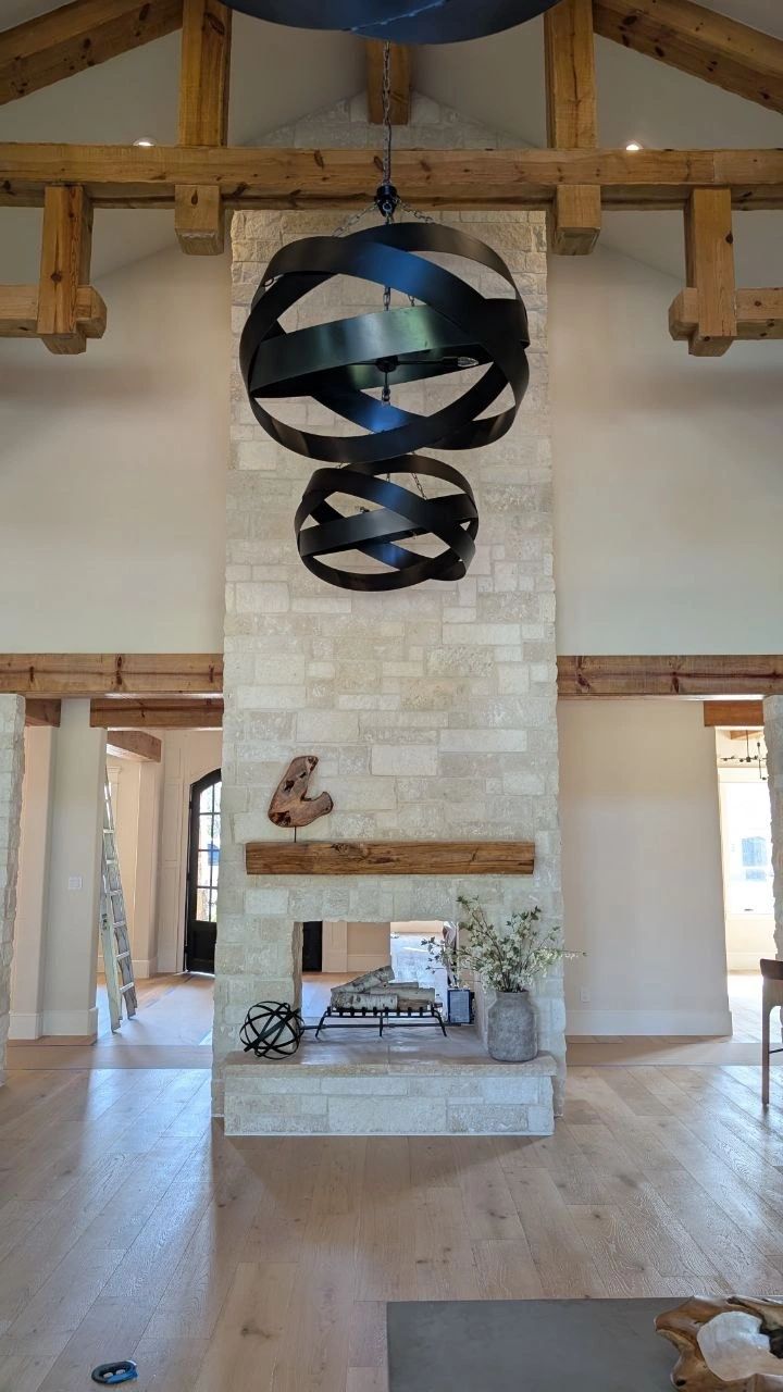 stone fireplace, hardwood flooring, flower mound