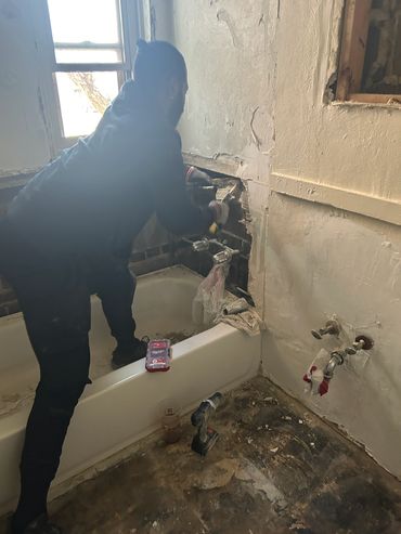 Mold and water damage in shower wall