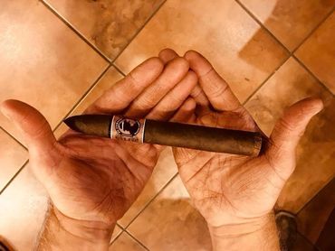 custom cigar in hand